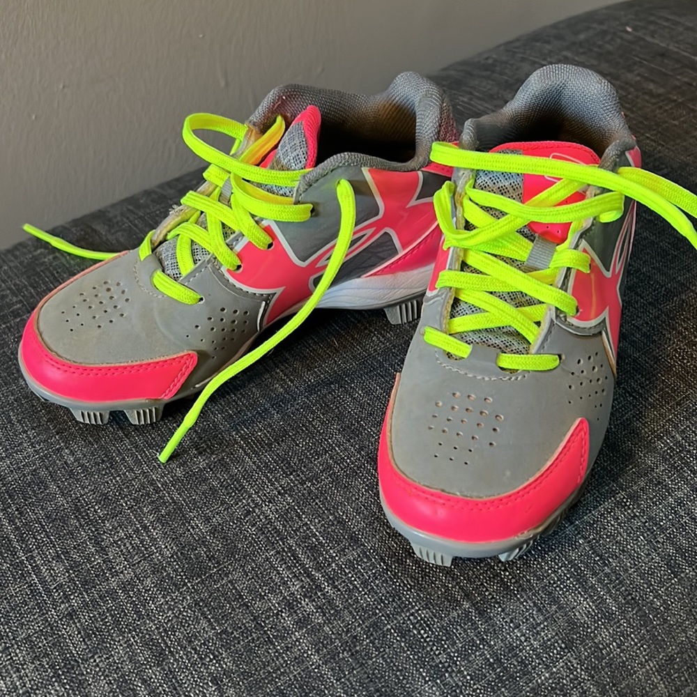 Girls softball cleats.